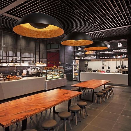 Park Hyatt Auckland Hotel Exterior photo The interior of a Starbucks Reserve store in Shanghai, China