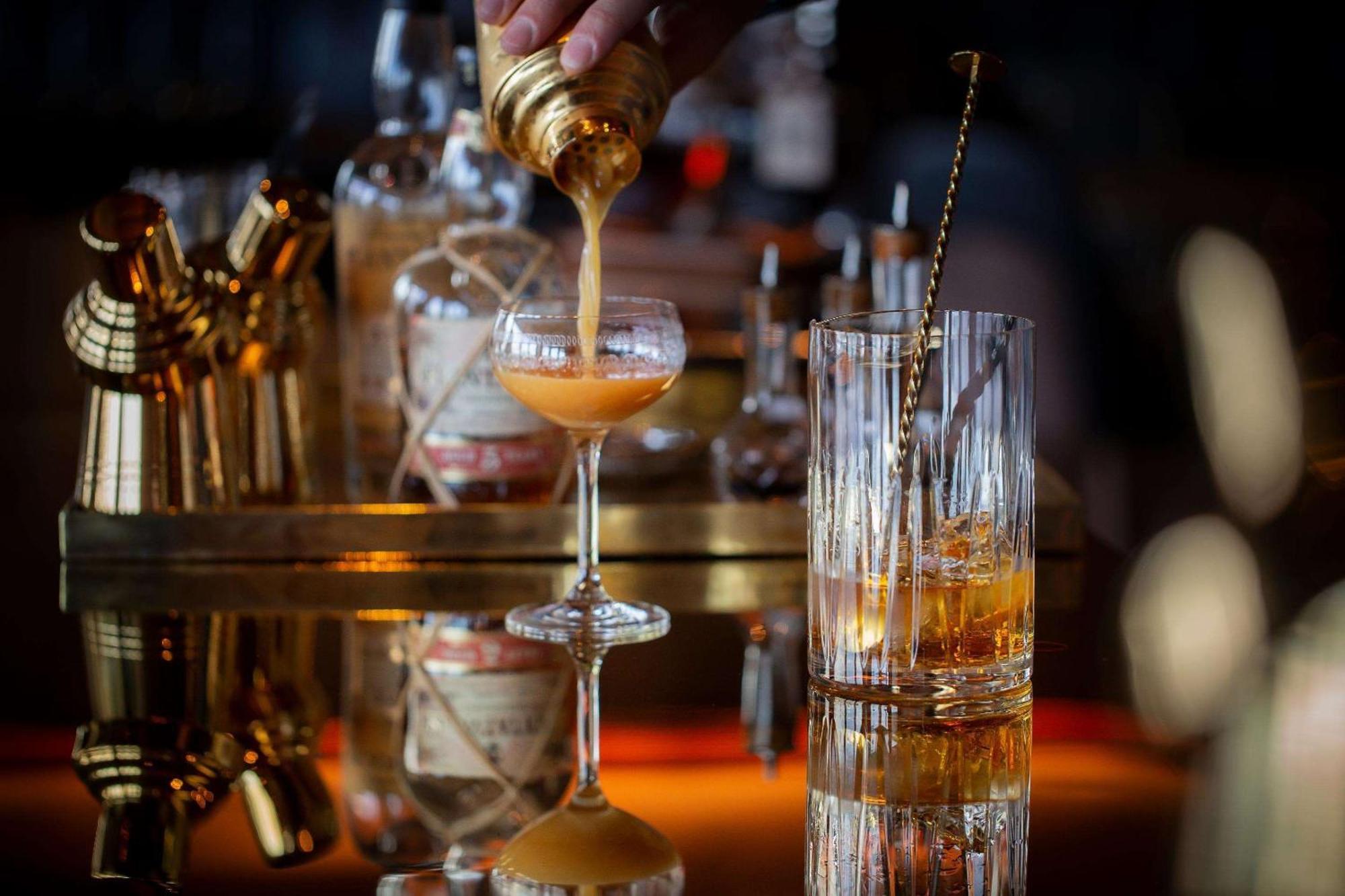Park Hyatt Auckland Hotel Exterior photo A bartender preparing a cocktail